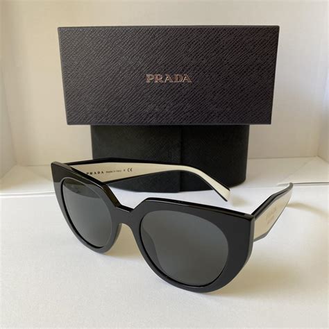 ladies black prada sunglasses|prada black and white sunglasses.